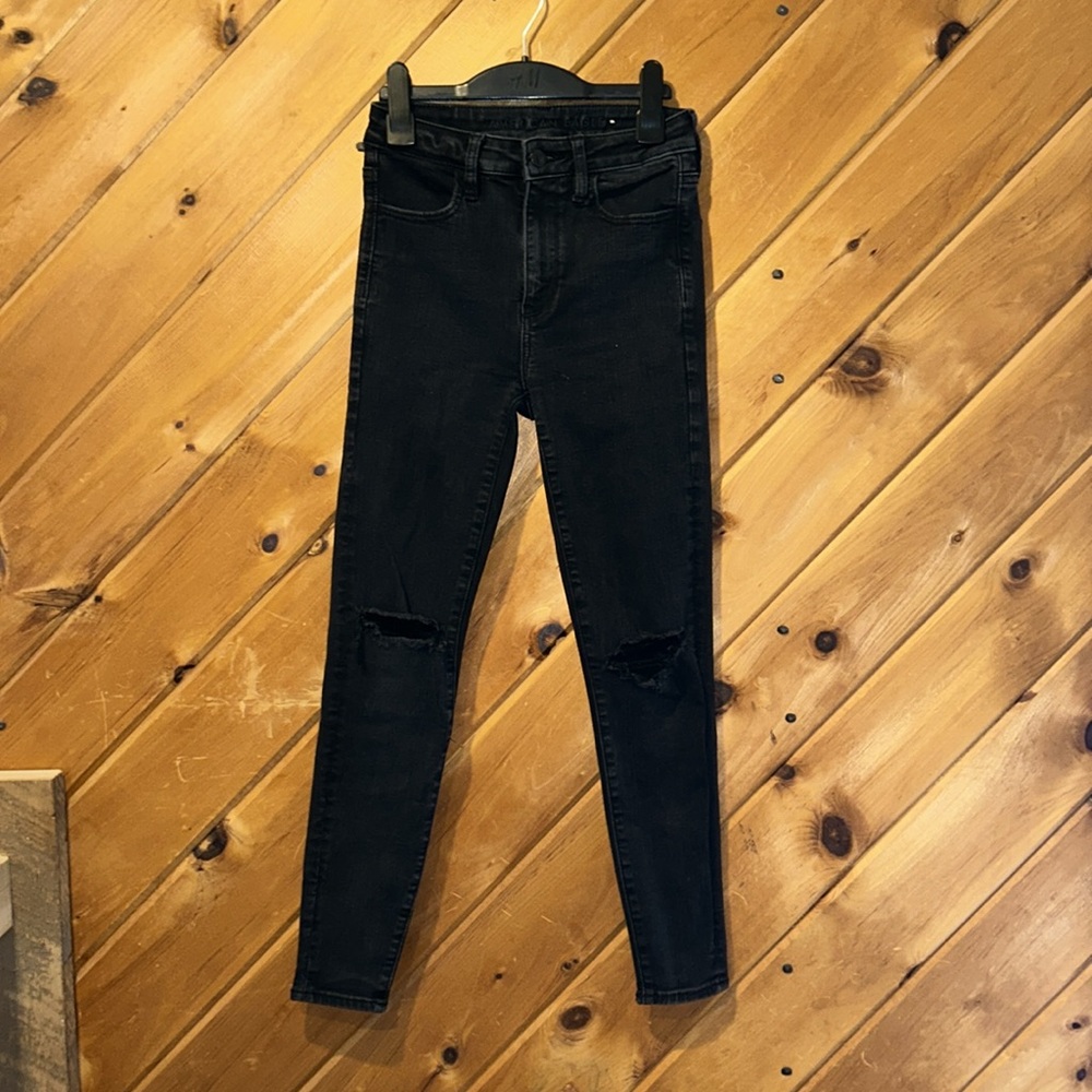 American Eagle super hi rise black distressed ripped skinny jeans
